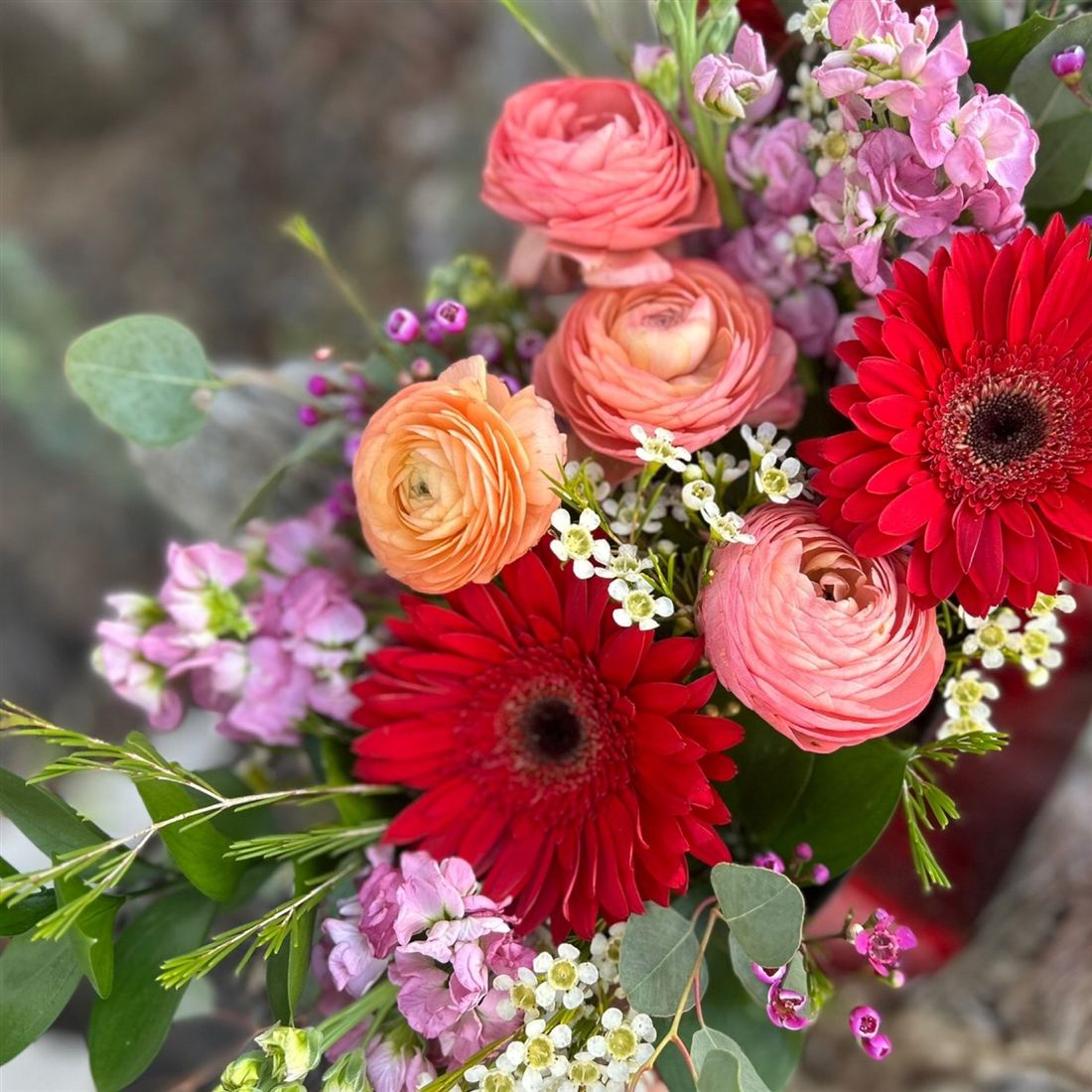 Seasonal floral arrangement by Vintage Blooms